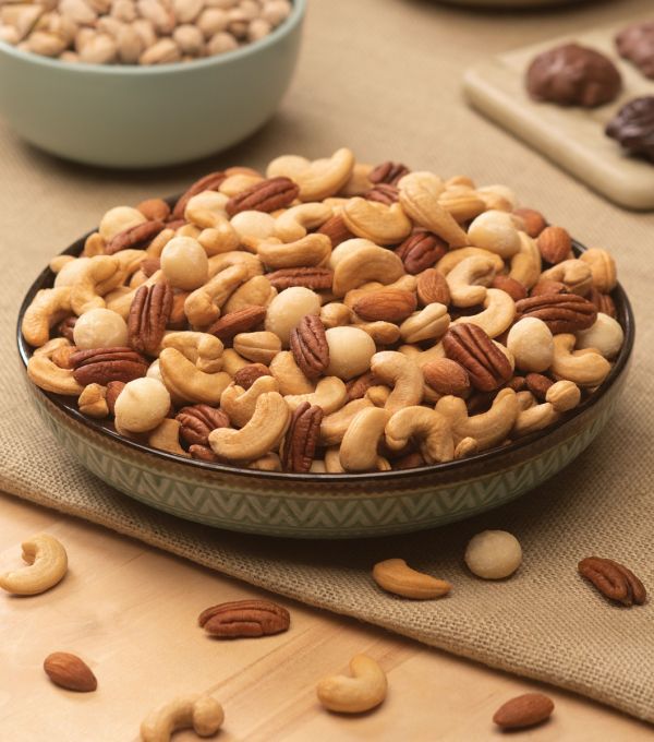 Mix Nuts駒 Mixed Nuts with Macadamias - 30 oz. Decanter | Koeze Direct